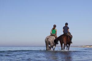 Reiter am Strand